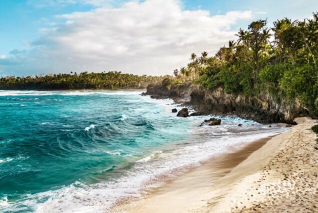 Empty palm-lined Pacifico Beach on the north coast of Siargao, Philippines - private north tour