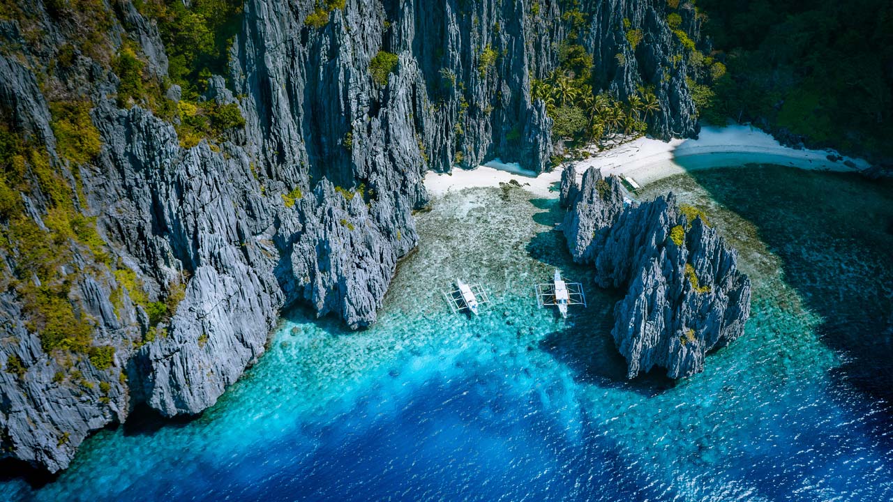 Limestone karst lagoons in El Nido, Palawan Philippines - El Nido vs Coron comparison 2026