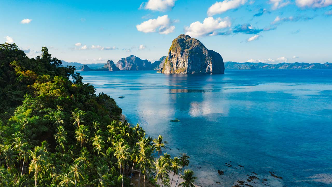 Bohol vs Palawan comparison - Chocolate Hills and El Nido lagoons