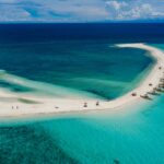 Camiguin vs Siargao comparison - White Island and Cloud 9