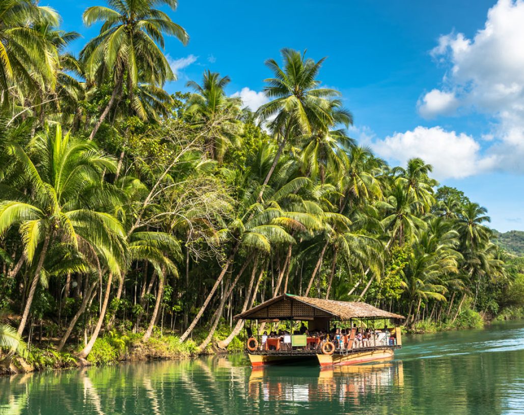 Traditional raft boat on River Loboc at Bohol island of Philippines